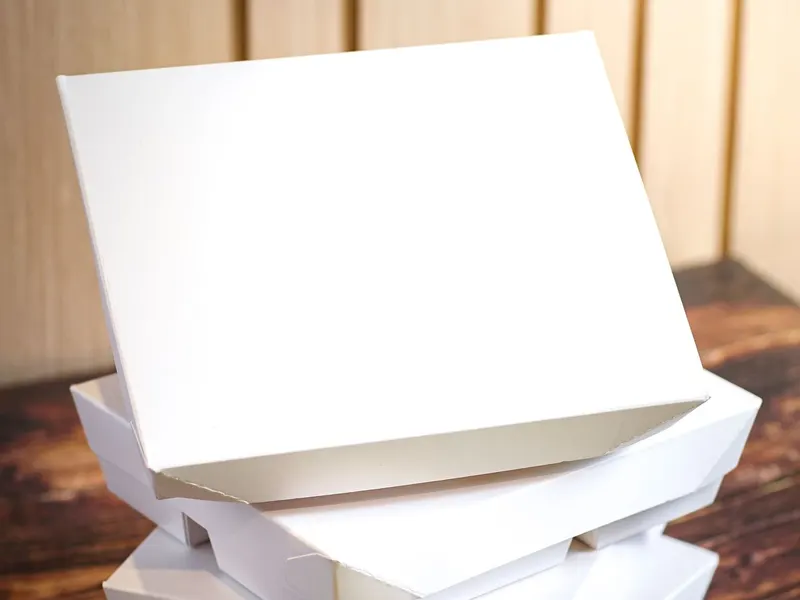 Stack of white paper boards