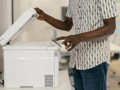 Person using a photocopier